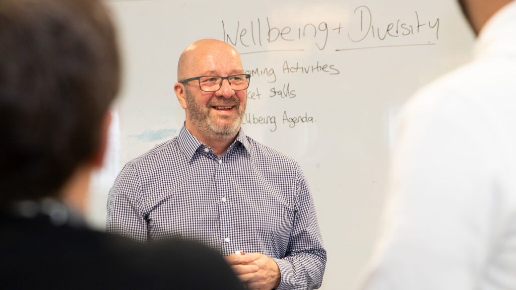 Member of Home Office staff doing. presentation on Wellbeing