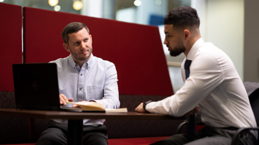 2 male members of Home Office staff