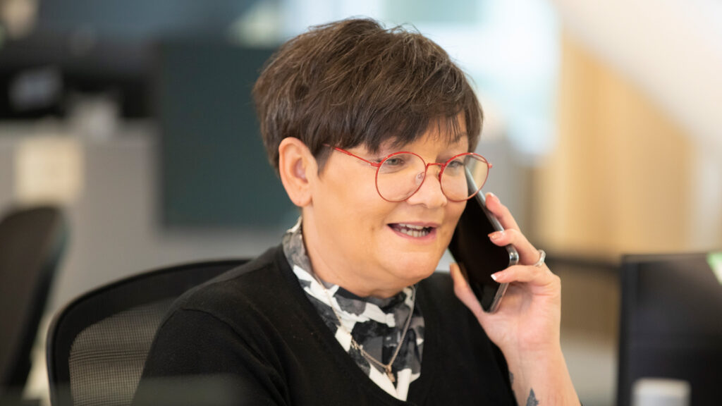 Female Member of Home Office staff talking on a mobile phone